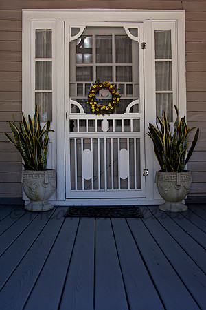 Screen door on front porch