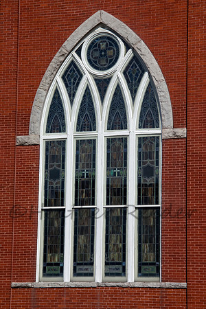 Elegant catherdral window with beautiful stained glass.