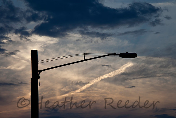 Street light silhouette against a beautiful sunset.