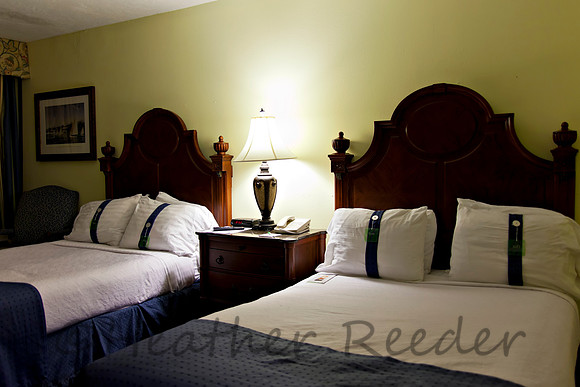 Double bed in a luxurious hotel room.